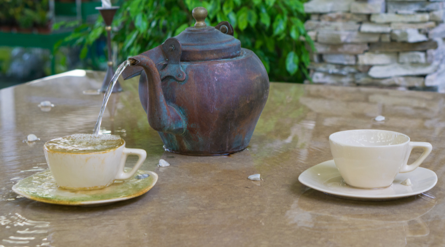 fountain made of cup and tea pot