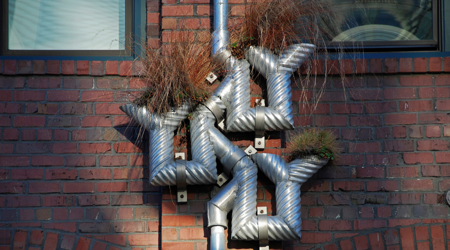 Galvanized gutter pipes and planters