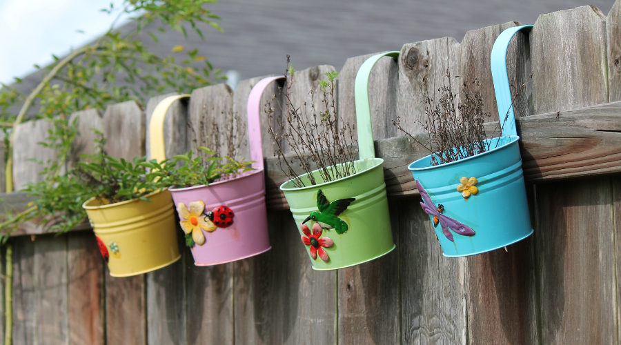 Pots Hanging on Fence