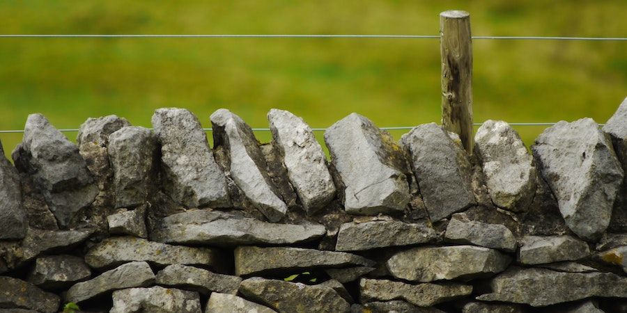 Capstones on retaining wall 