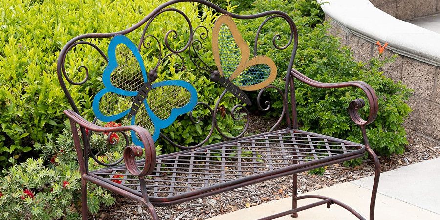 bronze bench with multicolored butterfly embellishments