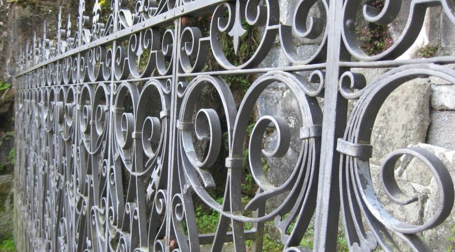 decorative wrought iron fence with intricate designs