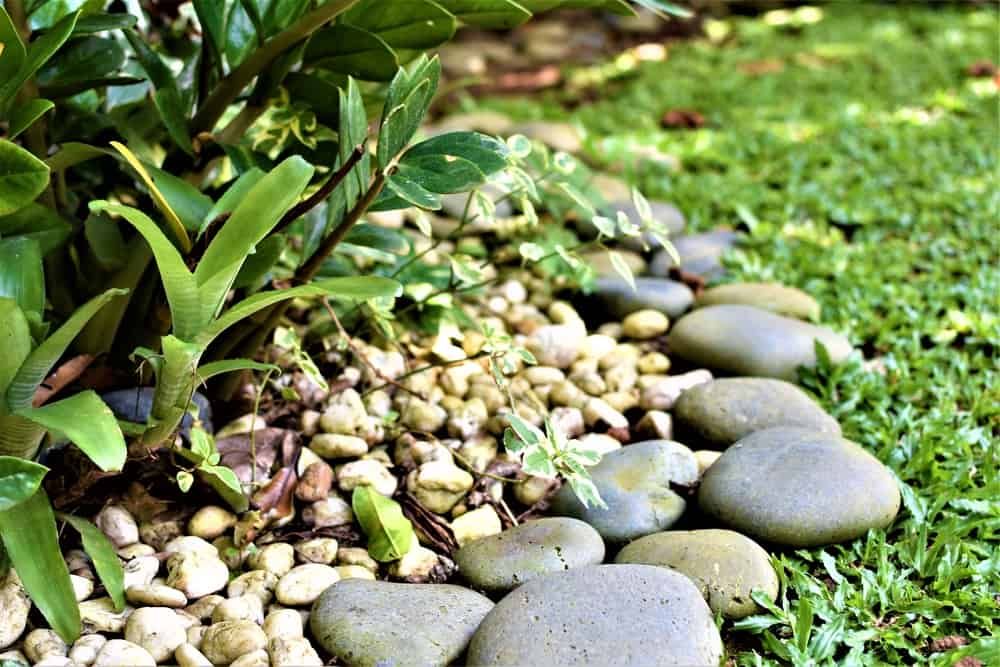 Small rocks close to a lawn