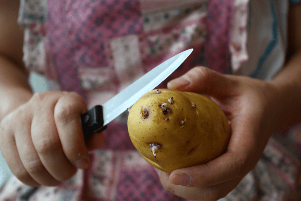 Cut the sprouting potatoes