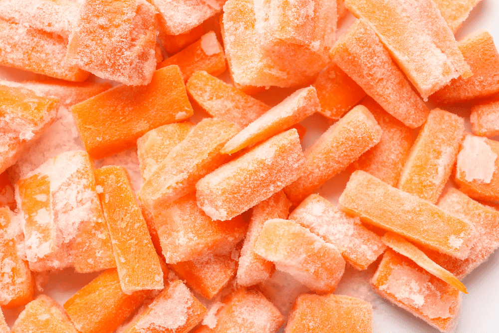 Frozen Carrot Pieces as Background