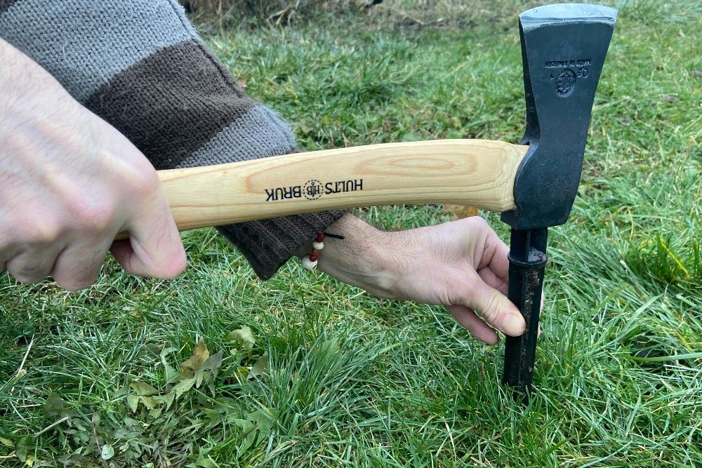 Almike Hatchet driving a tent stake