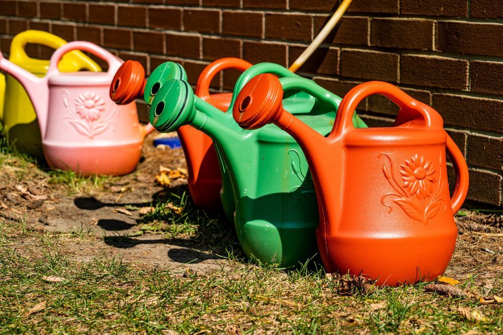 Watering cans outside
