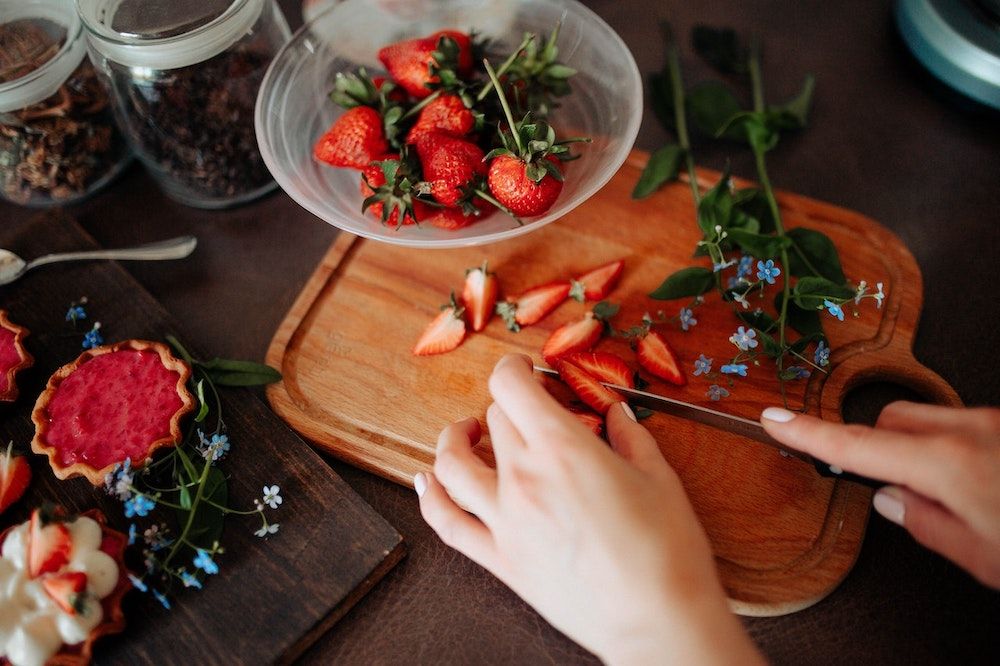 cutting strawberries