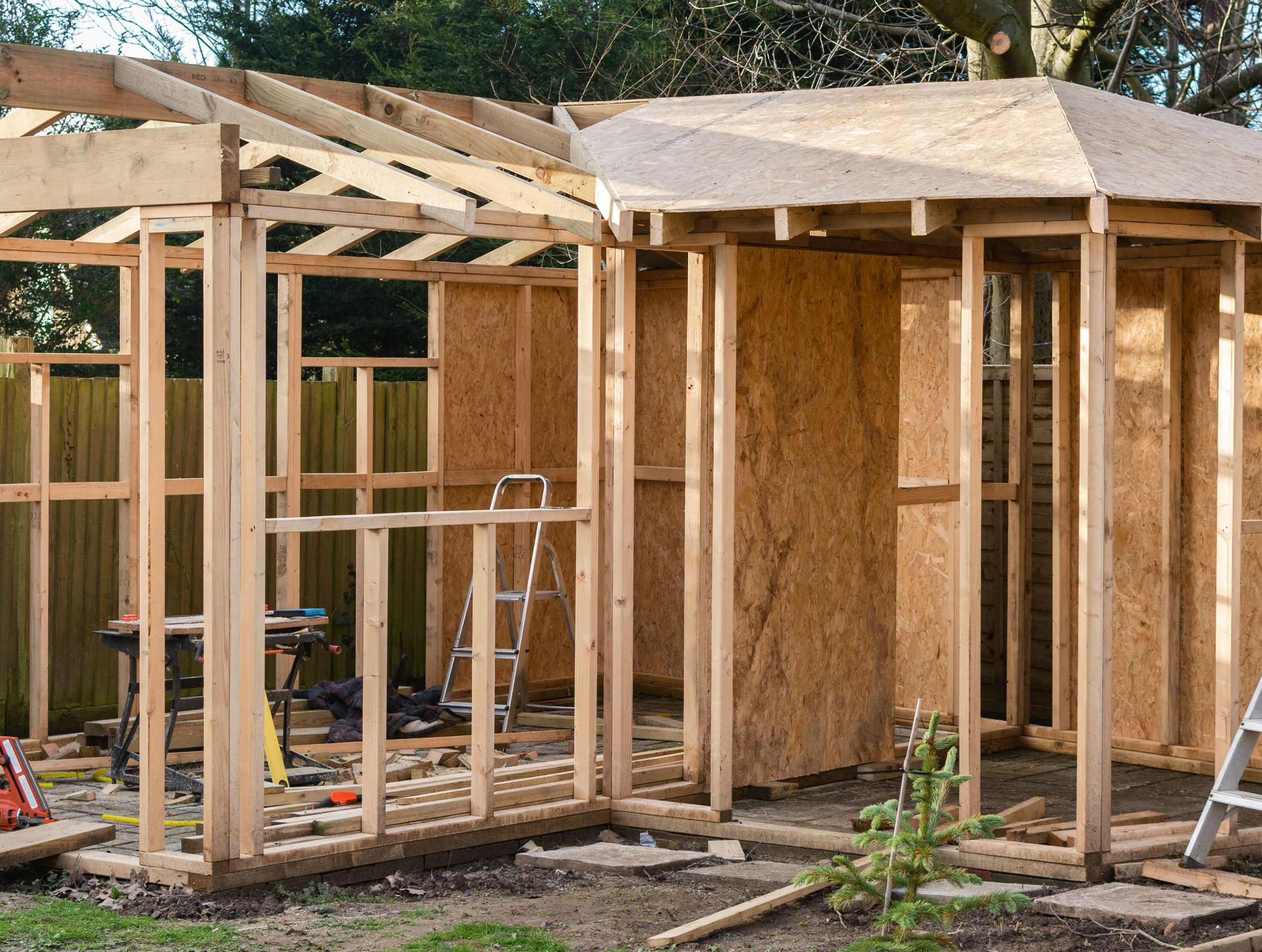 multi area DIY shed in backyard