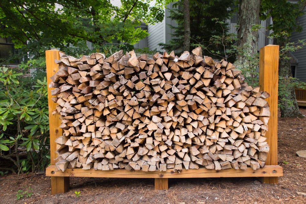 Outdoor rack with firewood logs