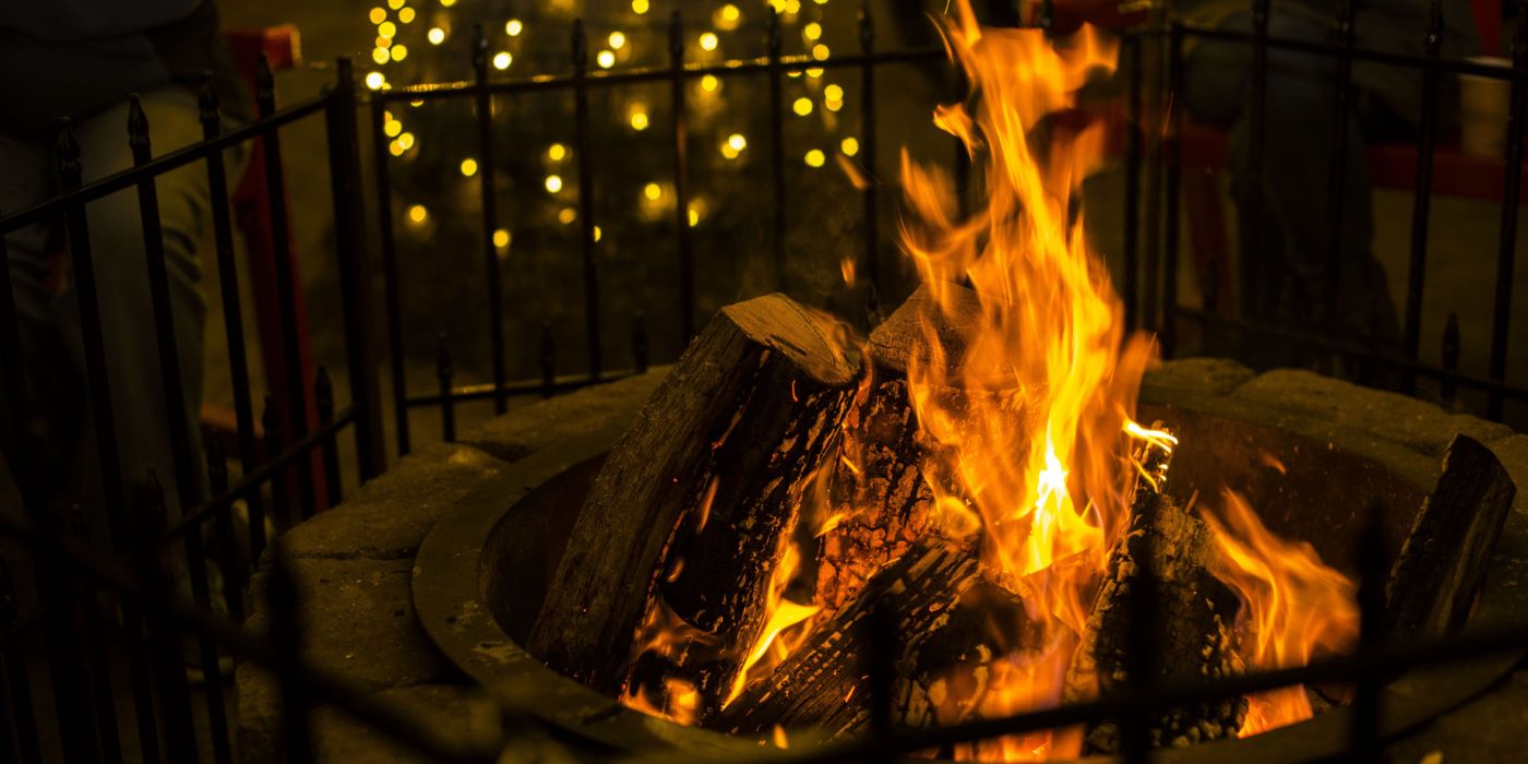 outdoor fire surrounded by fence 