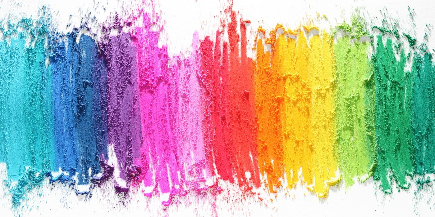 Rainbow of colors smeared on a white background