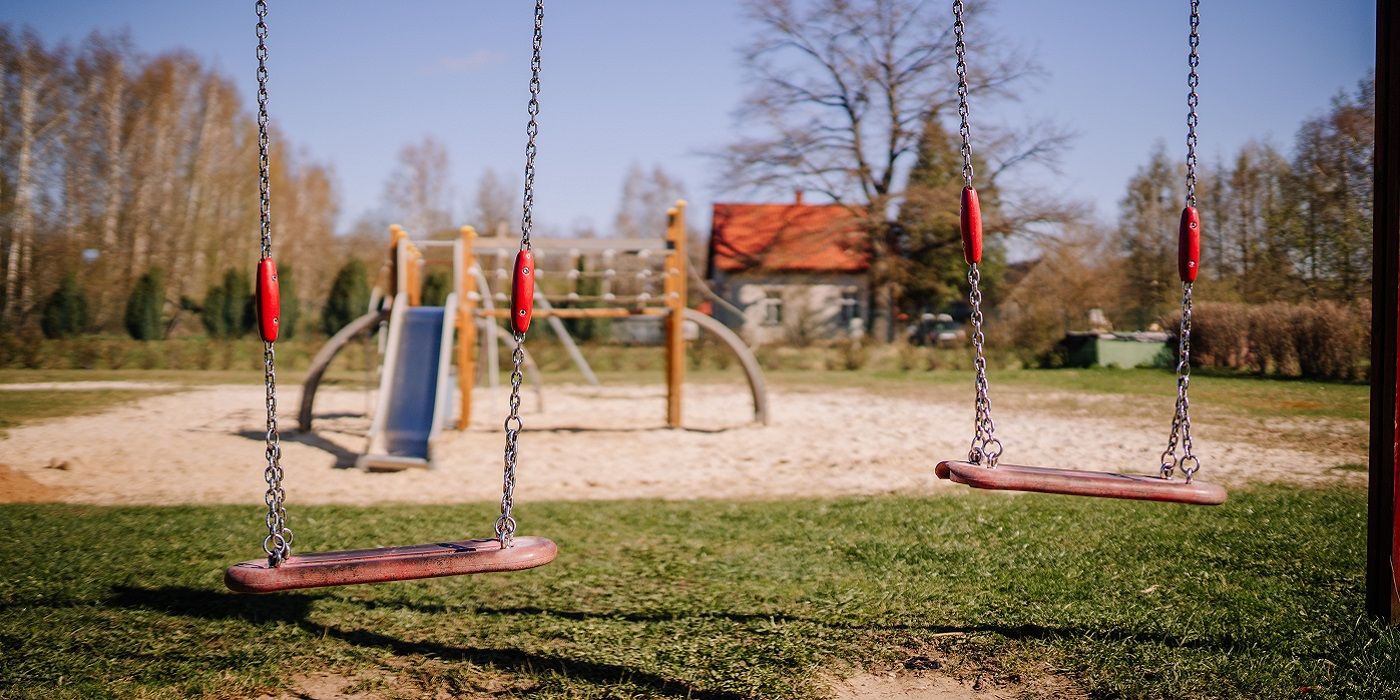 How to Anchor a Backyard Swing Set