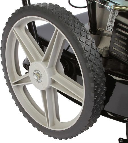 A grey and black high-end Remington string trimmer wheel with a clean white background..