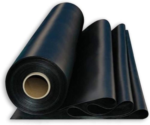 Roll of rubber roofing material.