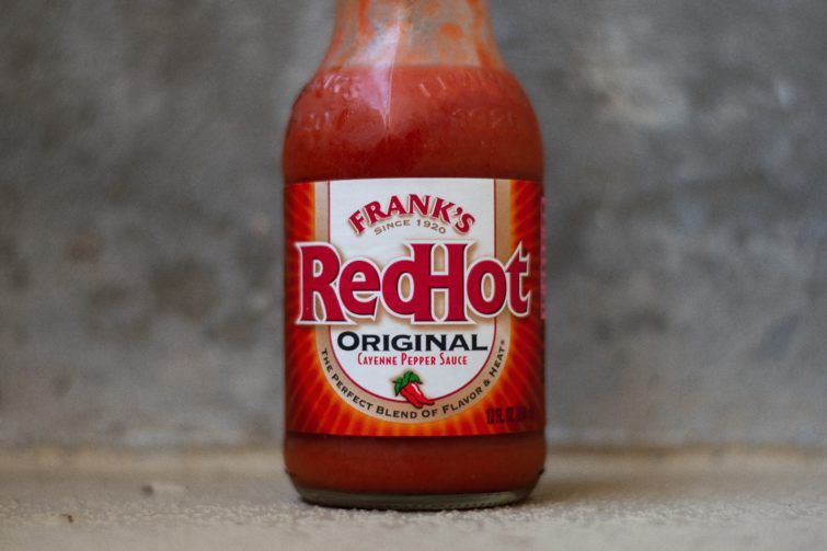A bottle Of Red Hot Sauce