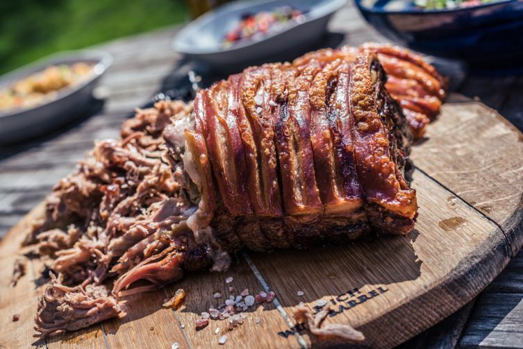Barbecue pork on a wooden plate